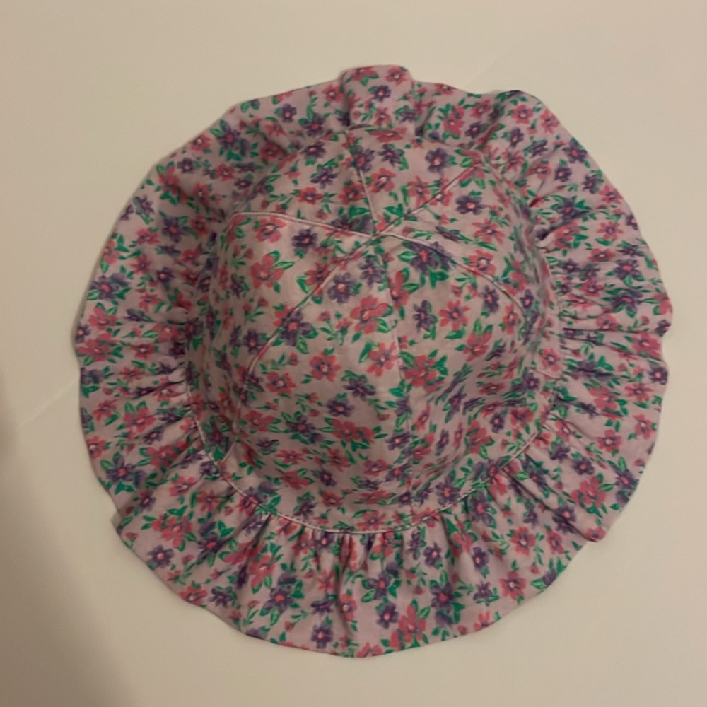 The Children Place bucket hat. Size XS / S (6 to 24 months). Floral, ruffle brim